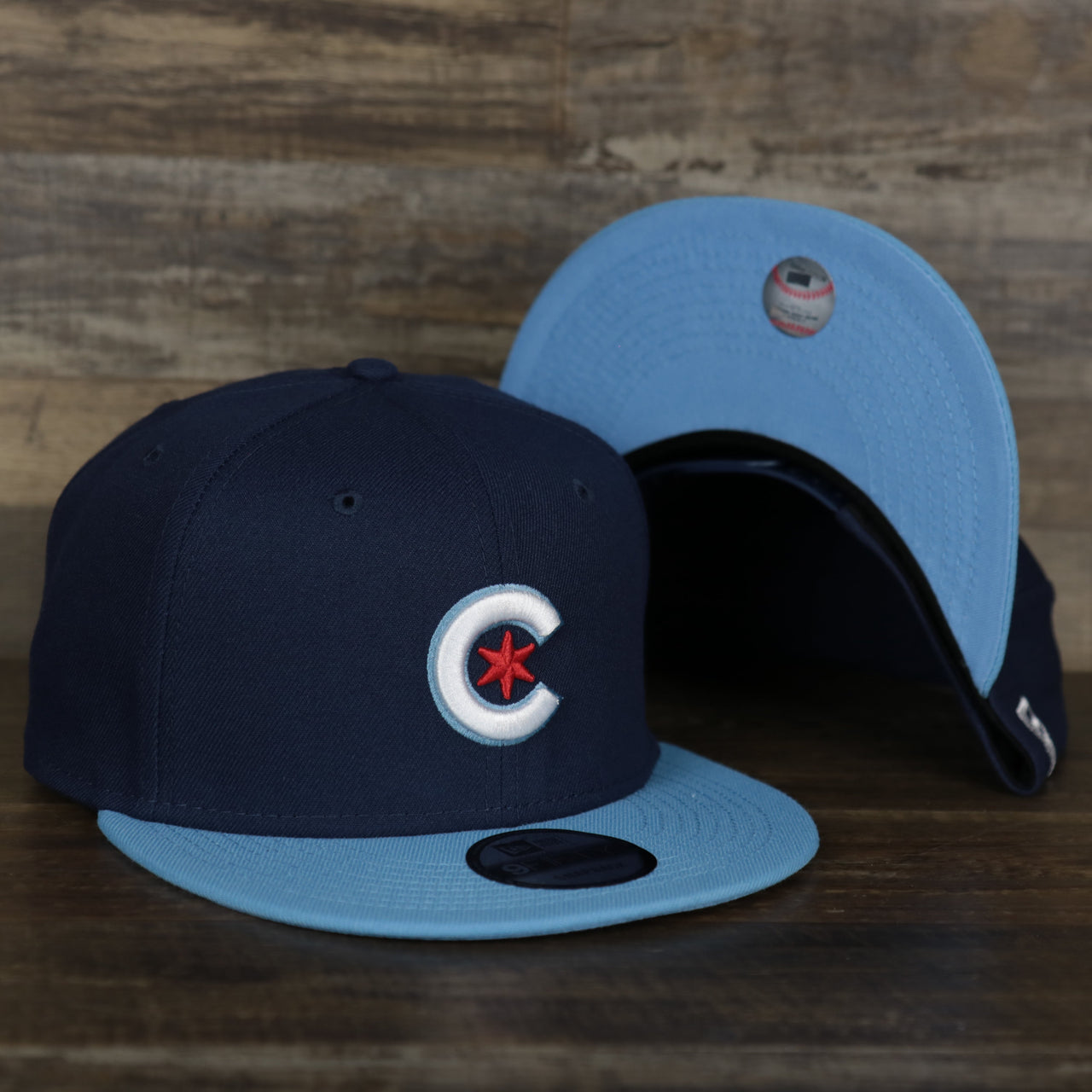 front and bottom of the Chicago Cubs MLB City Connect 2021 On-Field 9Fifty Blue Bottom Snapback | Navy Blue