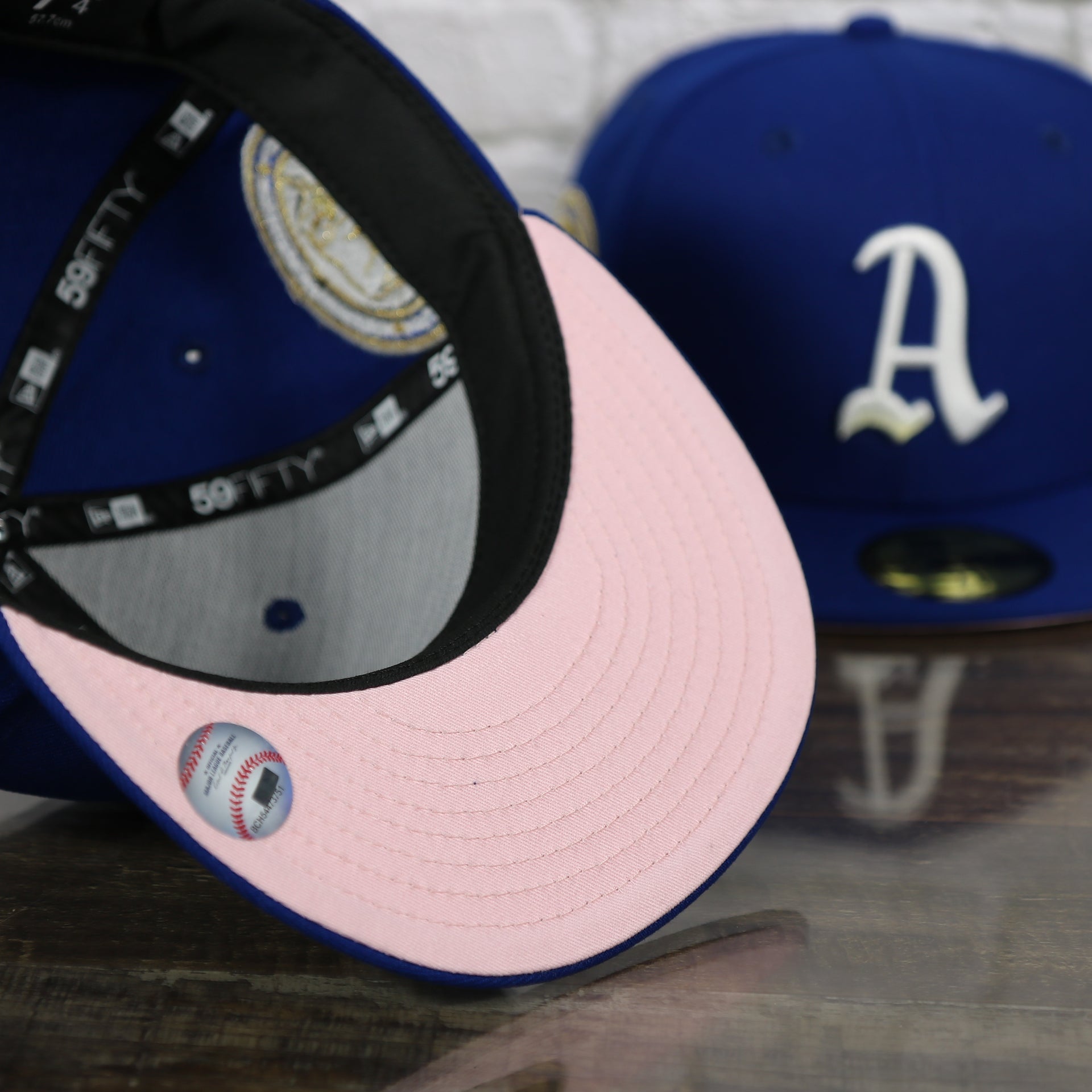 pink under visor on the Philadelphia Athletics 1911 World Series Side Patch Pink Bottom Royal 59Fifty Fitted Cap | "The Athletics Pack"