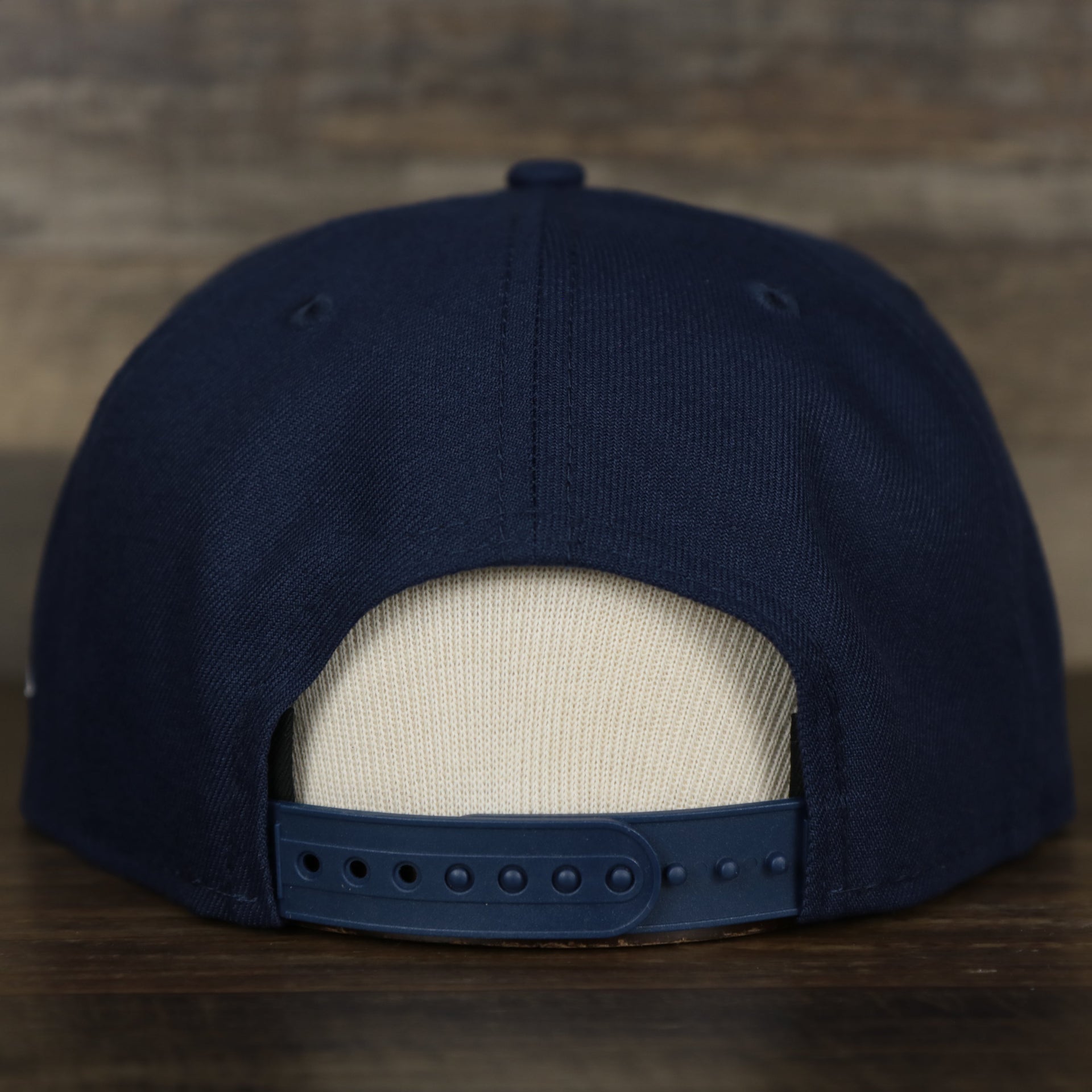back of the Chicago Cubs MLB City Connect 2021 On-Field 9Fifty Blue Bottom Snapback | Navy Blue