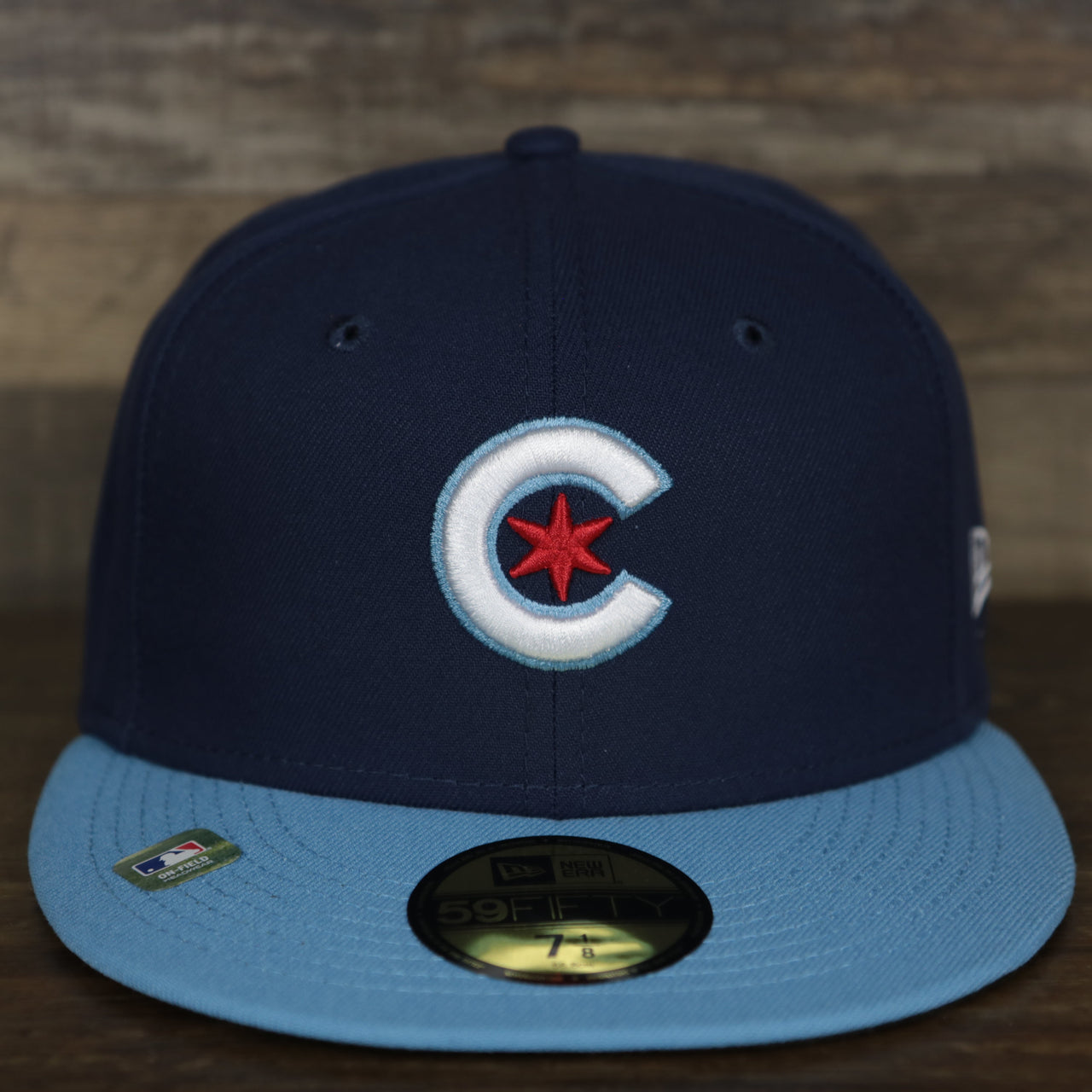 front of the Chicago Cubs MLB City Connect 2021 On-Field 59Fifty Black Bottom Fitted Hat | Navy Blue