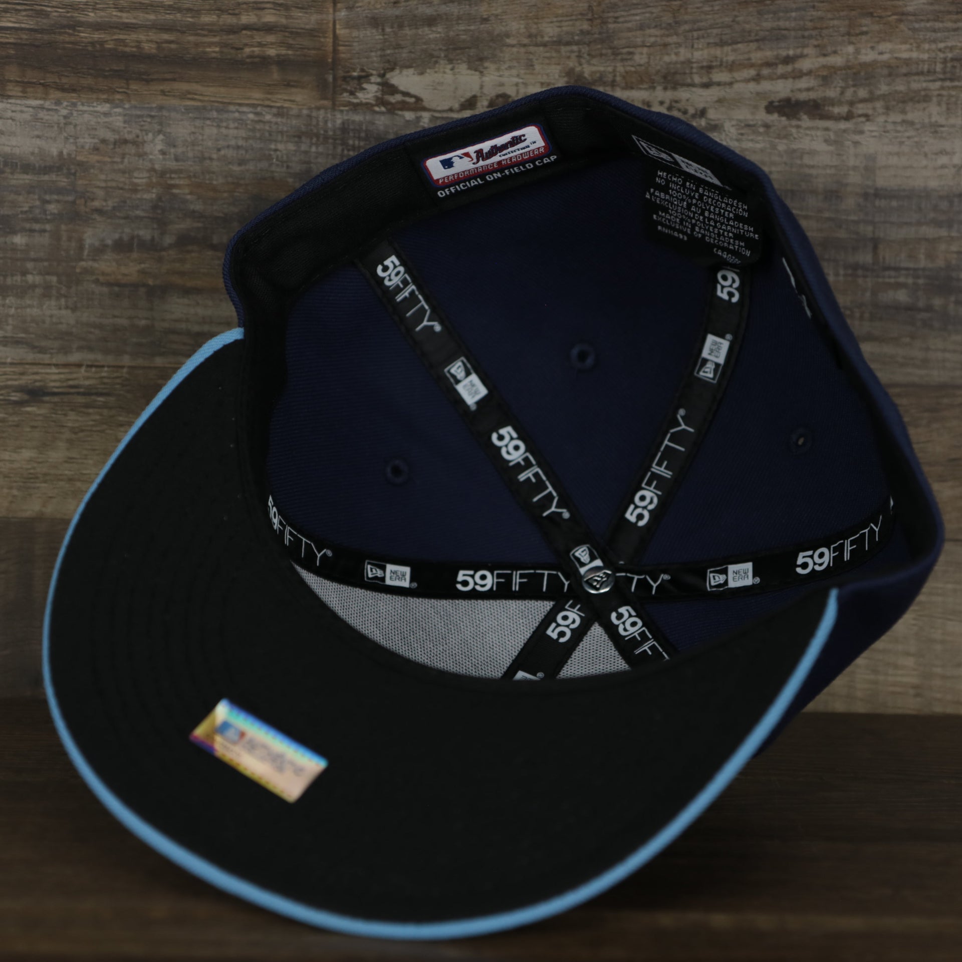 underside of the Chicago Cubs MLB City Connect 2021 On-Field 59Fifty Black Bottom Fitted Hat | Navy Blue