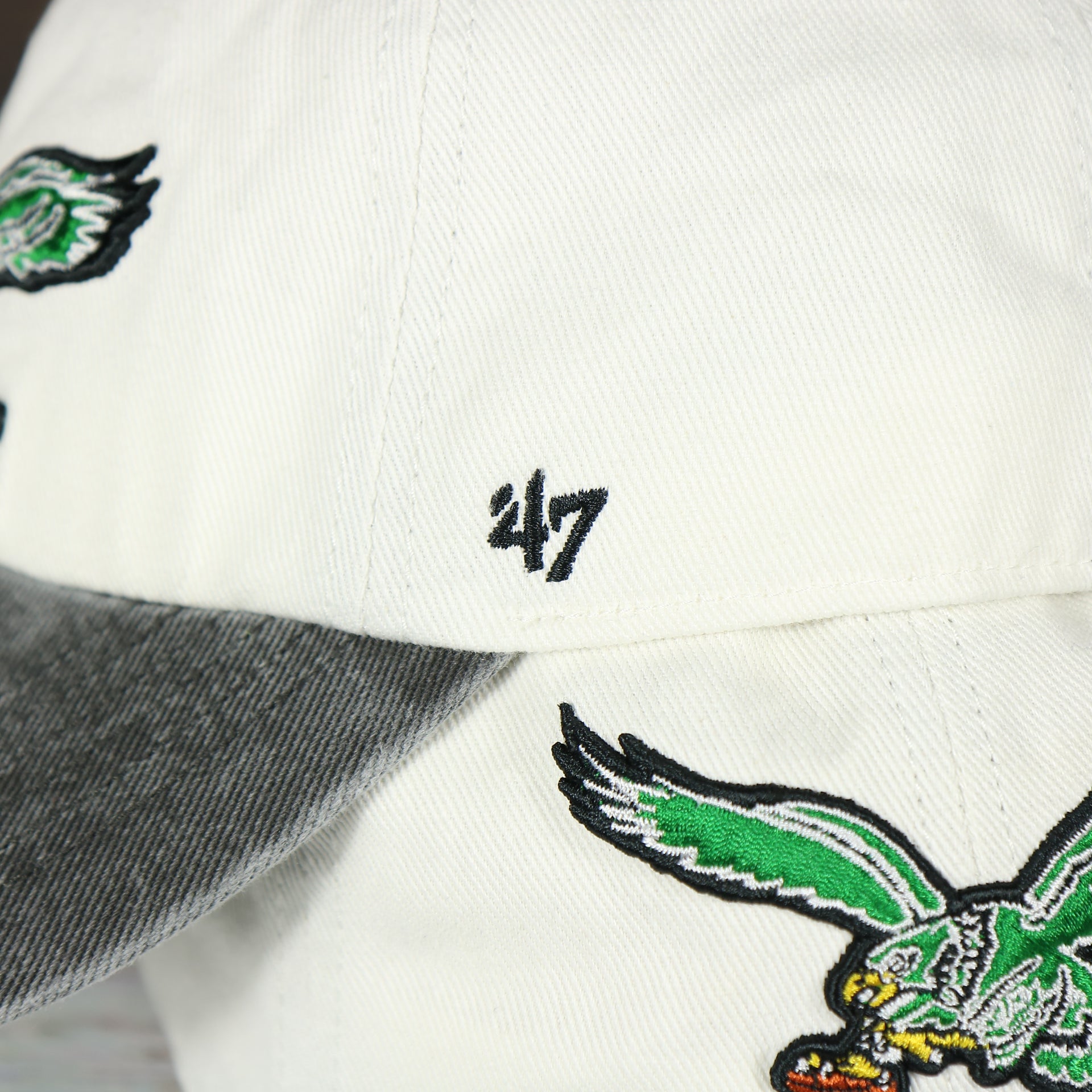 47 logo on the Philadelphia Eagles Throwback White Dad Hat Hat | White Adjustable Baseball Cap