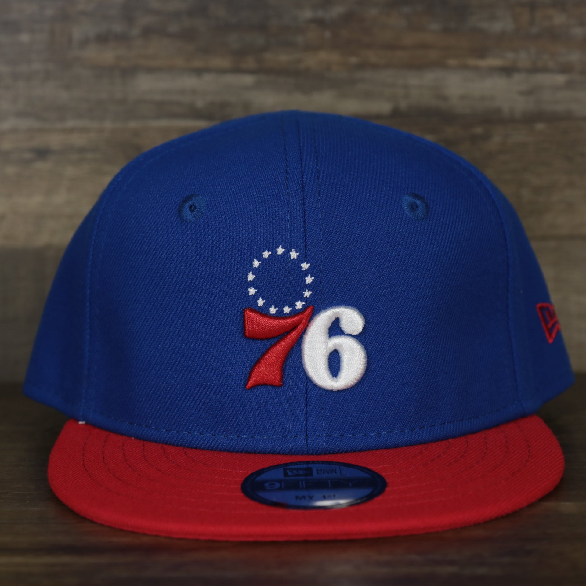 front of the Philadelphia 76ers My 1st 9Fifty Snapback | Infant | Blue/Red
