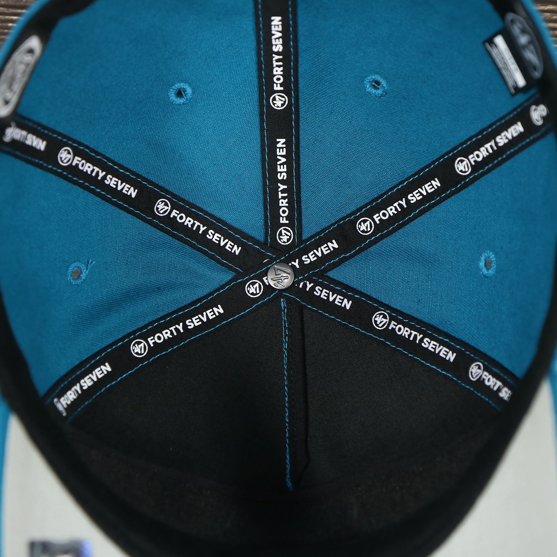 47 brand logo on the inside of the Anaheim Ducks Throwback Blue Snapback Dad Hat | Blue Adjustable Baseball Cap