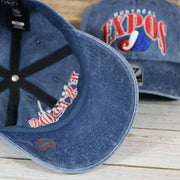 underside of the Montreal Expos Throwback Distressed Blue Dad Hat | Blue Adjustable Baseball Cap