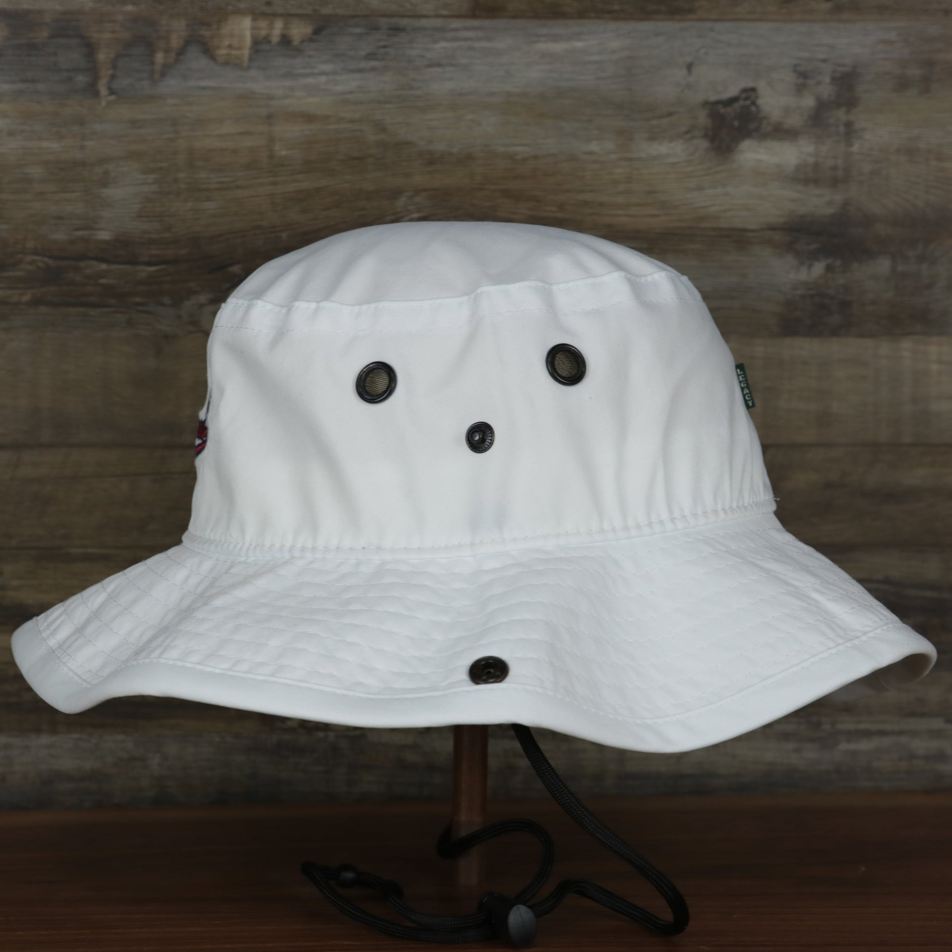 The wearer's left on the Ocean City Wildwood League Legacy Bucket Hat