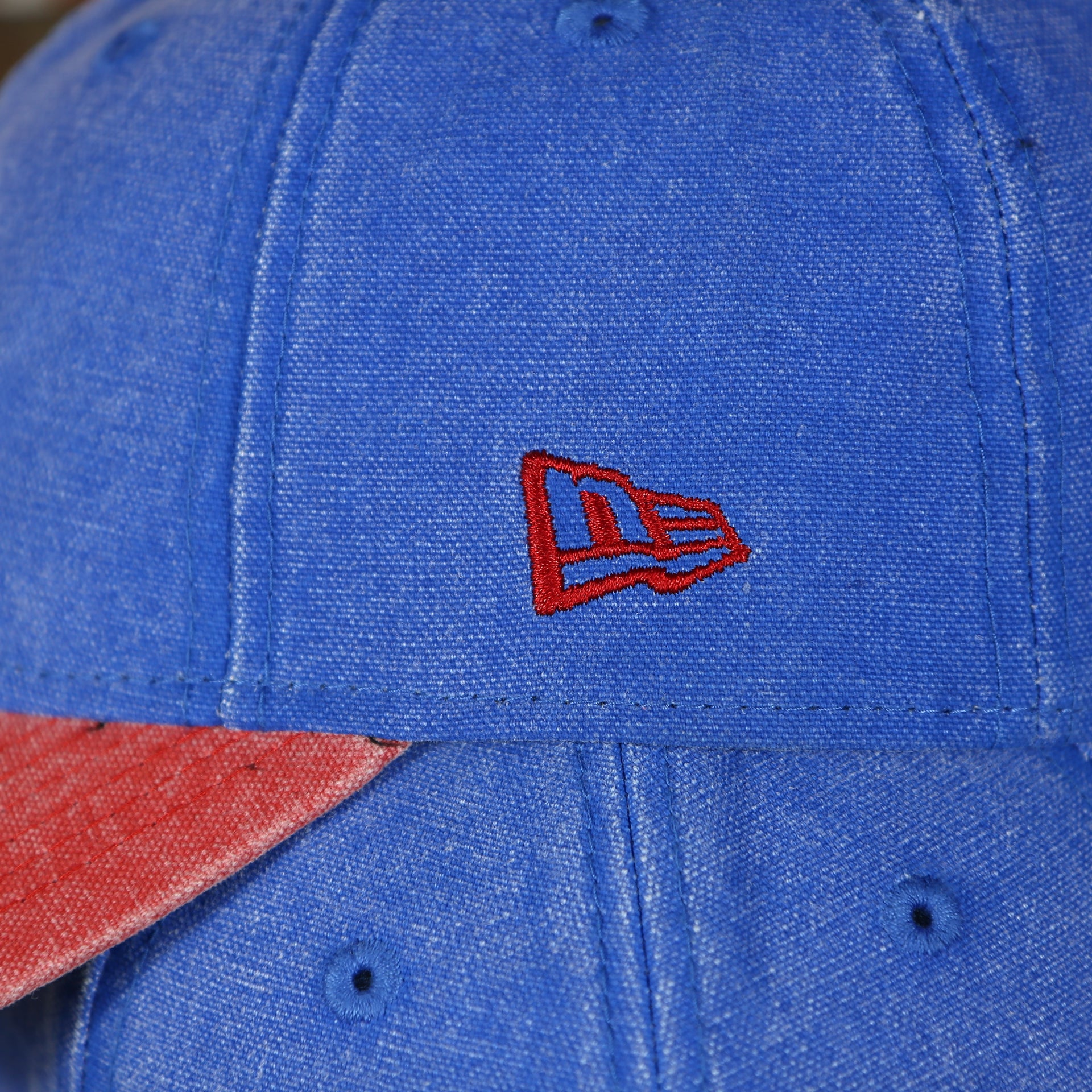 new era flag on the side of the Montreal Expos Throwback Distressed Denim Blue Women's Dad Hat | Blue Adjustable Baseball Cap