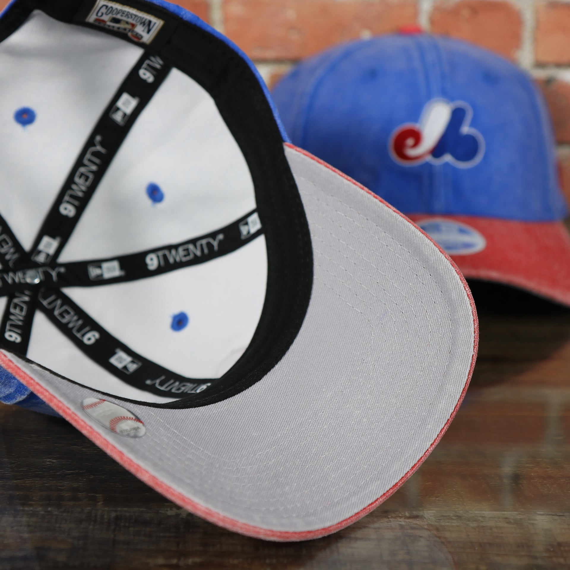 under side of the Montreal Expos Throwback Distressed Denim Blue Women's Dad Hat | Blue Adjustable Baseball Cap