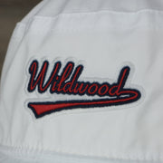A close up of the word Wildwood on the Ocean City Wildwood League Legacy Bucket Hat