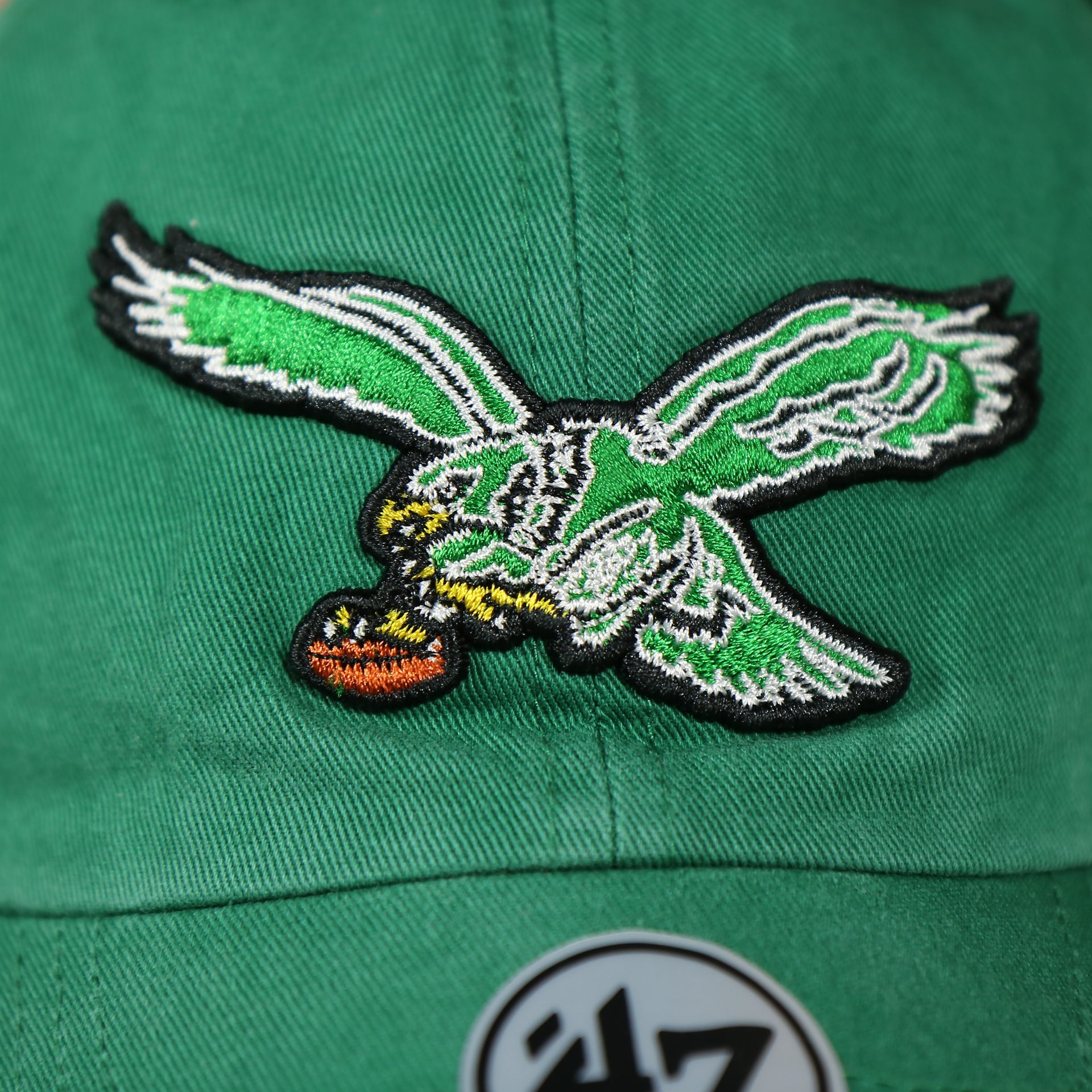 eagles logo on the Philadelphia Eagles Throwback Distressed White Dad Hat Hat | White Adjustable Baseball Cap