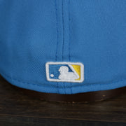 A close up of the MLB Batterman logo on the Boston Red Sox MLB City Connect 2021 On-Field Side Patch 59Fifty Fitted