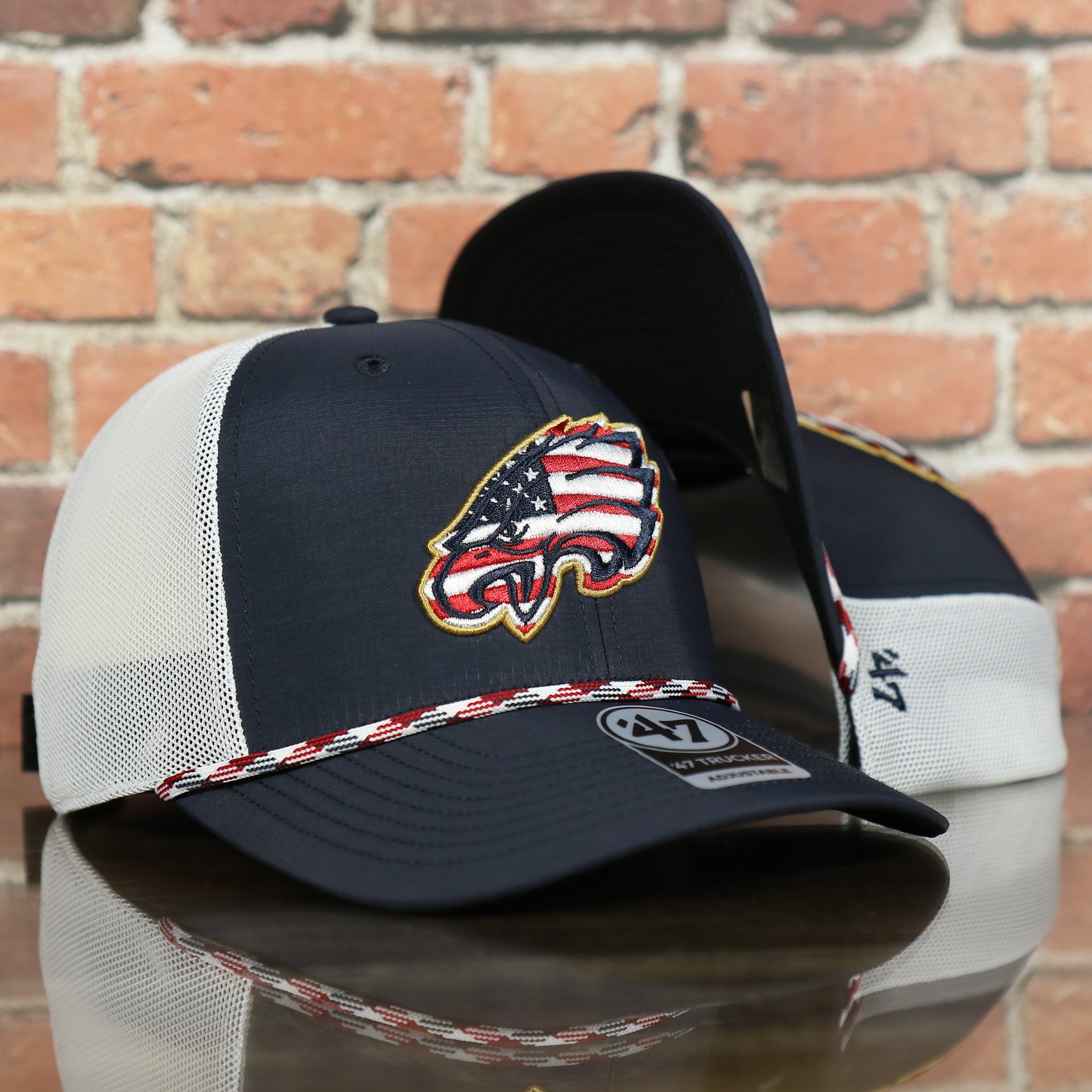 front side of the Philadelphia Eagles American Flag Mesh Back Trucker Hat | Navy Trucker Hat