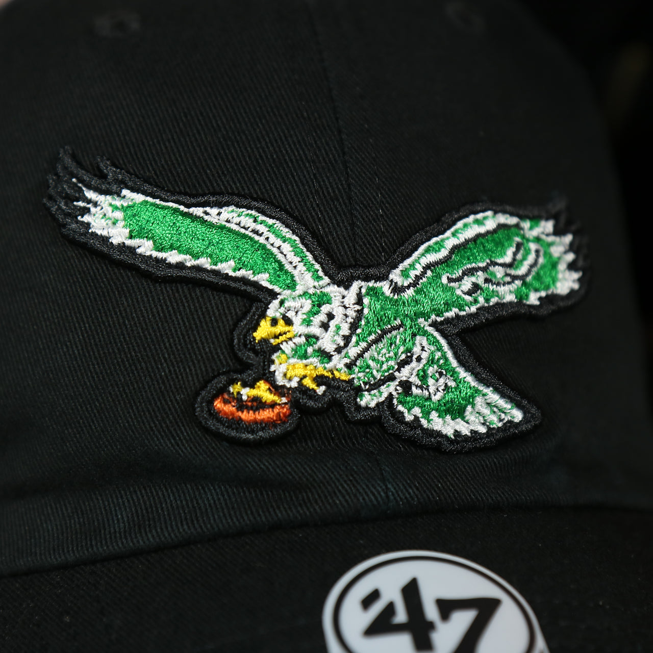 eagles logo on the Throwback Philadelphia Eagles Black Adjustable Dad Hat