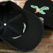 black under visor of the Throwback Philadelphia Eagles Black Adjustable Dad Hat