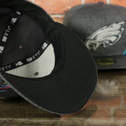 black under visor on the Eagles Breast Cancer awareness fitted hat | Philadelphia eagles crucial catch sideline 59fifity fitted cap bca