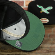 green under visor on the Philadelphia Eagles Vintage 1933 Heritage Series Retro Crown Black  59Fifty Fitted Cap