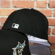 backside of the Marlins On-Field Grey Bottom Fitted Cap | Florida Marlins 1997 Game Worn World Series Side Patch Gray Under Brim 59Fifty Fitted Hat
