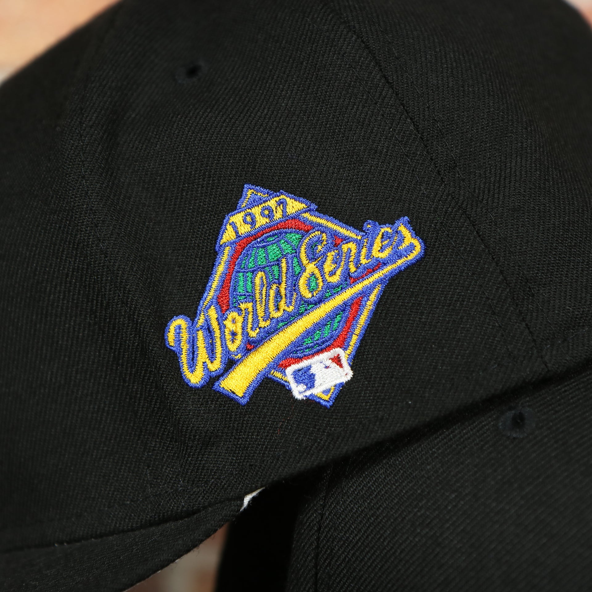 wearers left of the Marlins On-Field Grey Bottom Fitted Cap | Florida Marlins 1997 Game Worn World Series Side Patch Gray Under Brim 59Fifty Fitted Hat