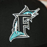 marlins logo on the Marlins On-Field Grey Bottom Fitted Cap | Florida Marlins 1997 Game Worn World Series Side Patch Gray Under Brim 59Fifty Fitted Hat