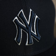 A close up of the Yankees logo on the New York Yankees Onfield 2022 Batting Practice 59Fifty Trucker Hat