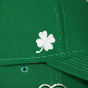 clover logo on the side of the Boston Red Sox ST. Patrick's Dad  Logo Green Bottom Dad Hat | Green Dad Hat