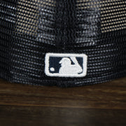 A close up of the MLB Batterman logo on the New York Yankees Onfield 2022 Batting Practice 59Fifty Trucker Hat