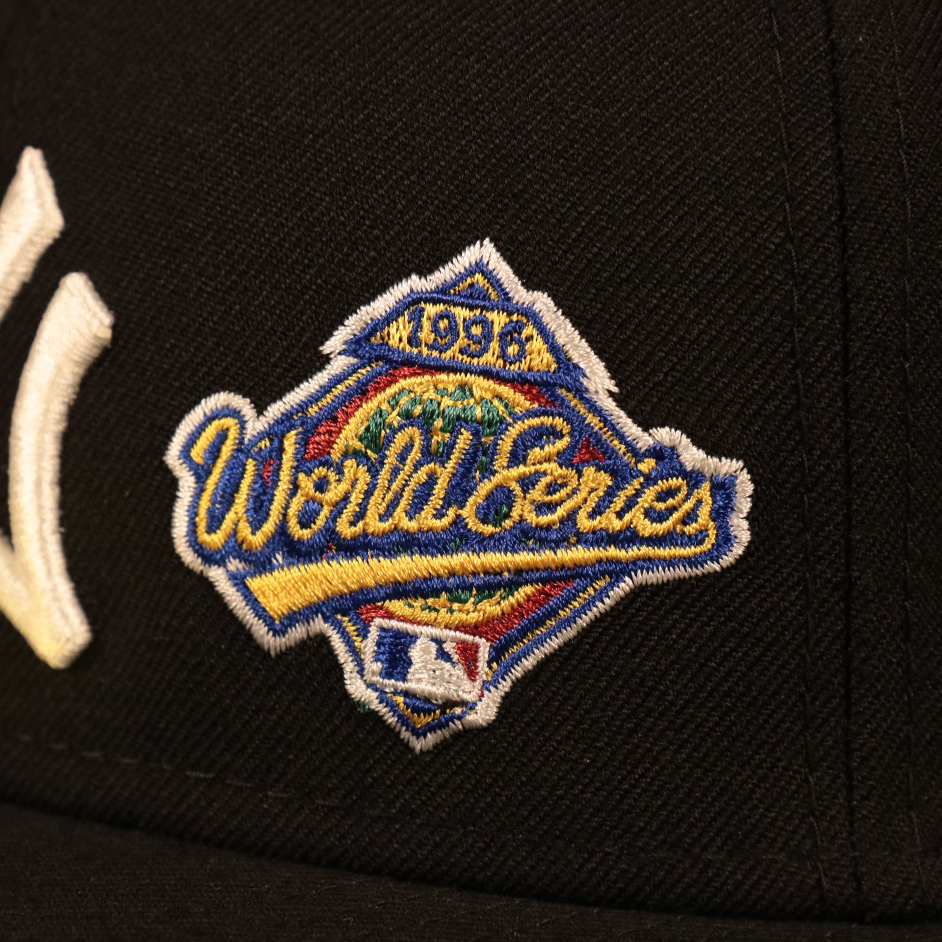 1996 World Series Patch embroidered on the front of the New York Yankees 1996 World Series Script Patch Gray Bottom 59Fifty Fitted Cap