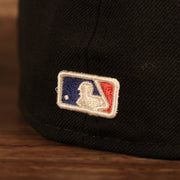 Close up of the MLB Batterman logo on the back of the New York Yankees 1996 World Series Script Patch Gray Bottom 59Fifty Fitted Cap