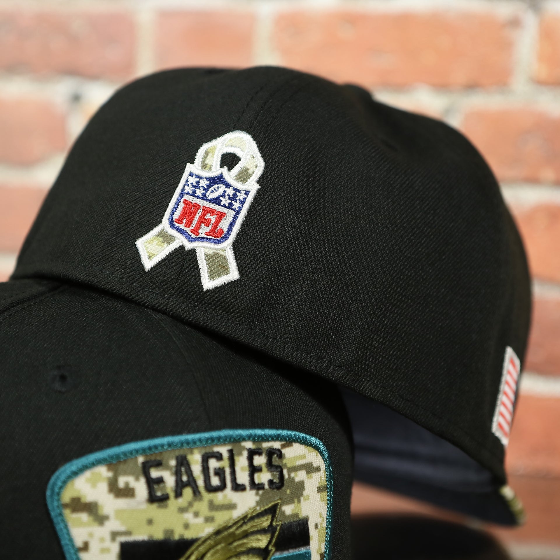 NFL patch on the Philadelphia Eagles 2021 Salute To Service On Field Sideline 59Fifty Fitted Cap