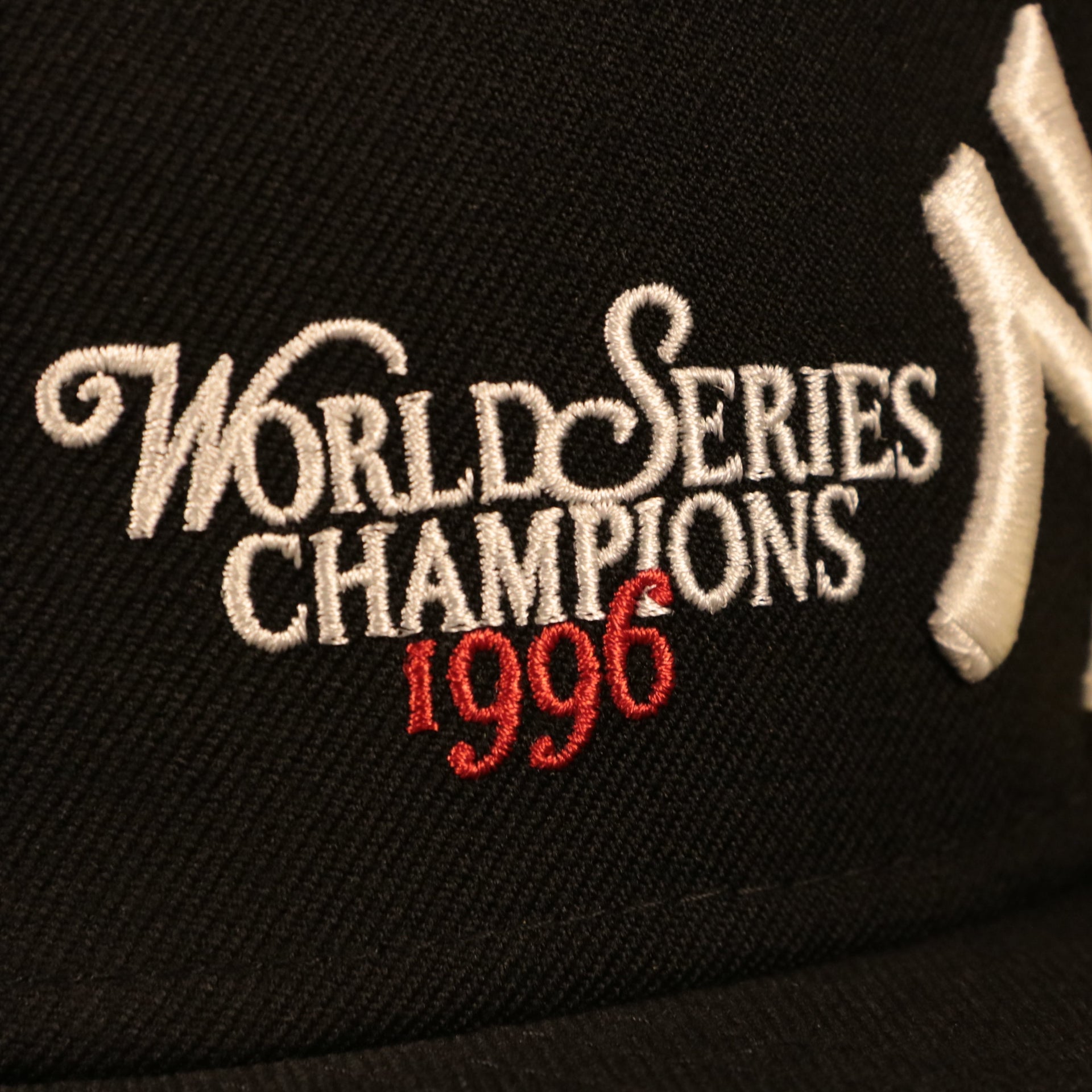 Close up of the World Series Champions 1996 embroidered on the front of the New York Yankees 1996 World Series Script Patch Gray Bottom 59Fifty Fitted Cap