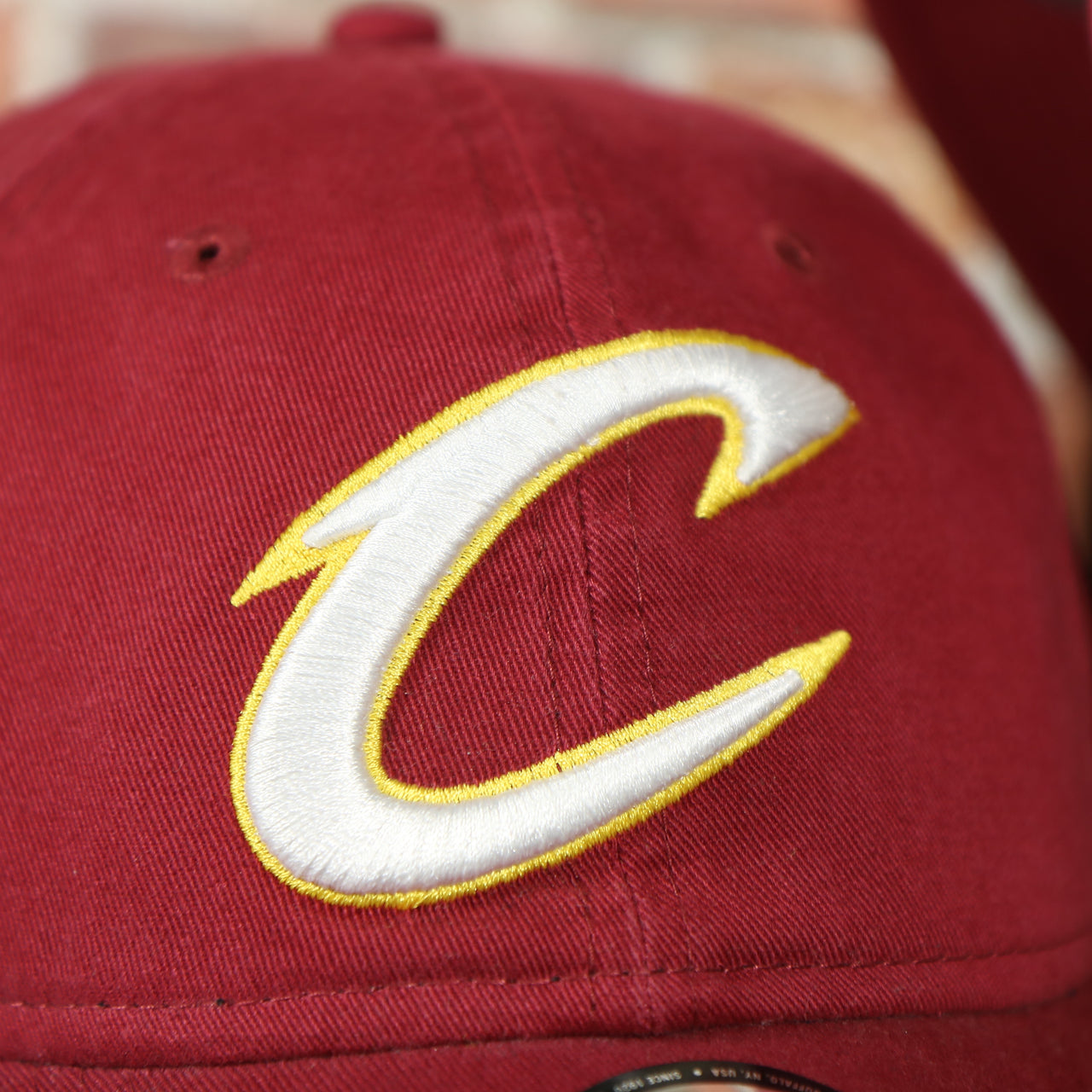 cavaliers logo on the Cavaliers Dad Hat | Cleveland Cavaliers Red Dad Hat | Adjustable | OSFM