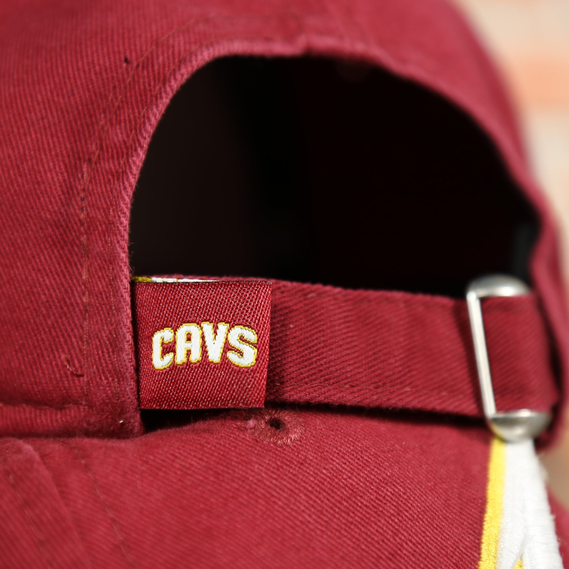 cavs label on the Cavaliers Dad Hat | Cleveland Cavaliers Red Dad Hat | Adjustable | OSFM