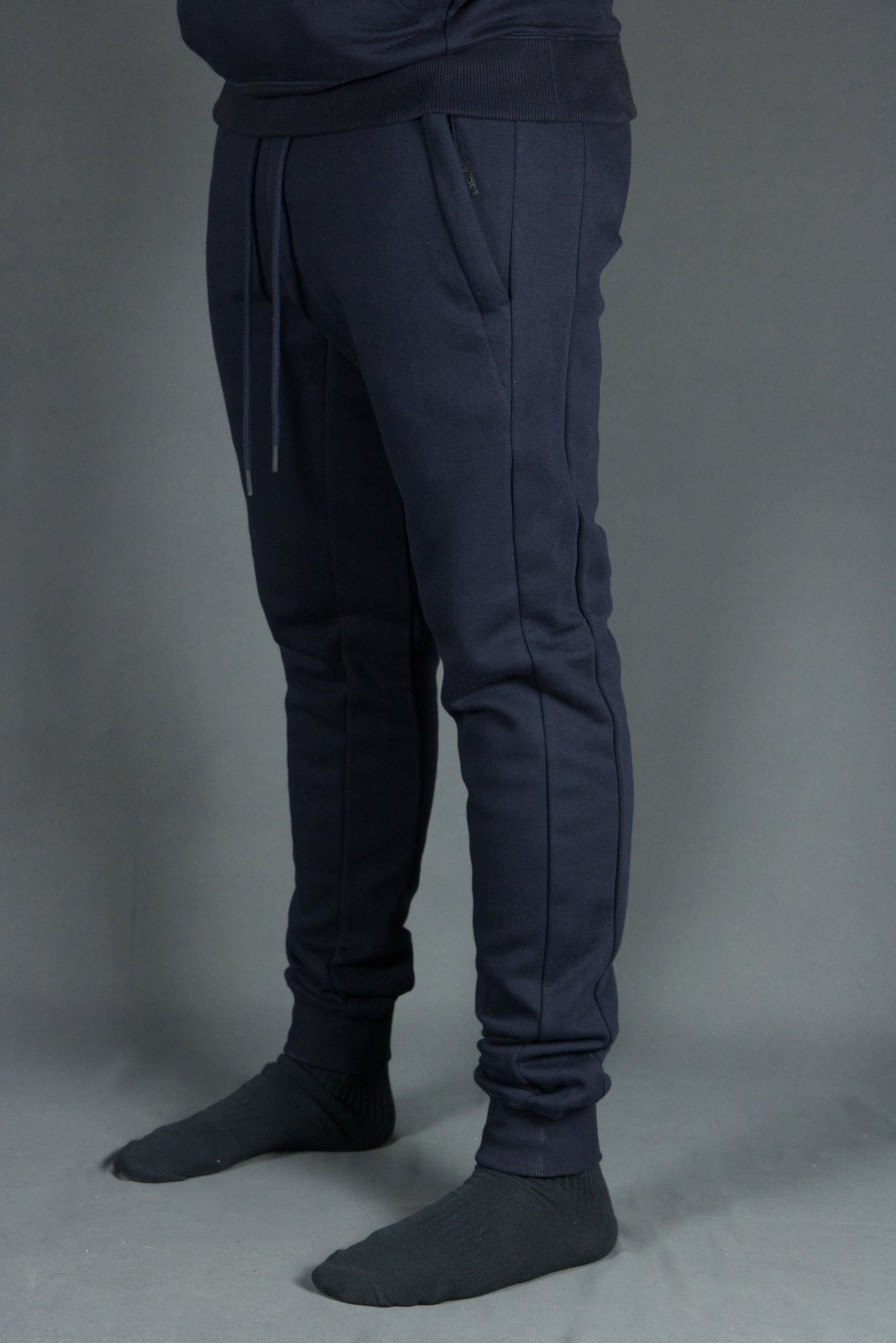 The navy Jordan Craig sweatpants with cool logo trim bottom.