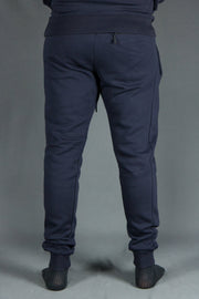 The back side of the Jordan Craig navy jogger pants with logo trim bottom.