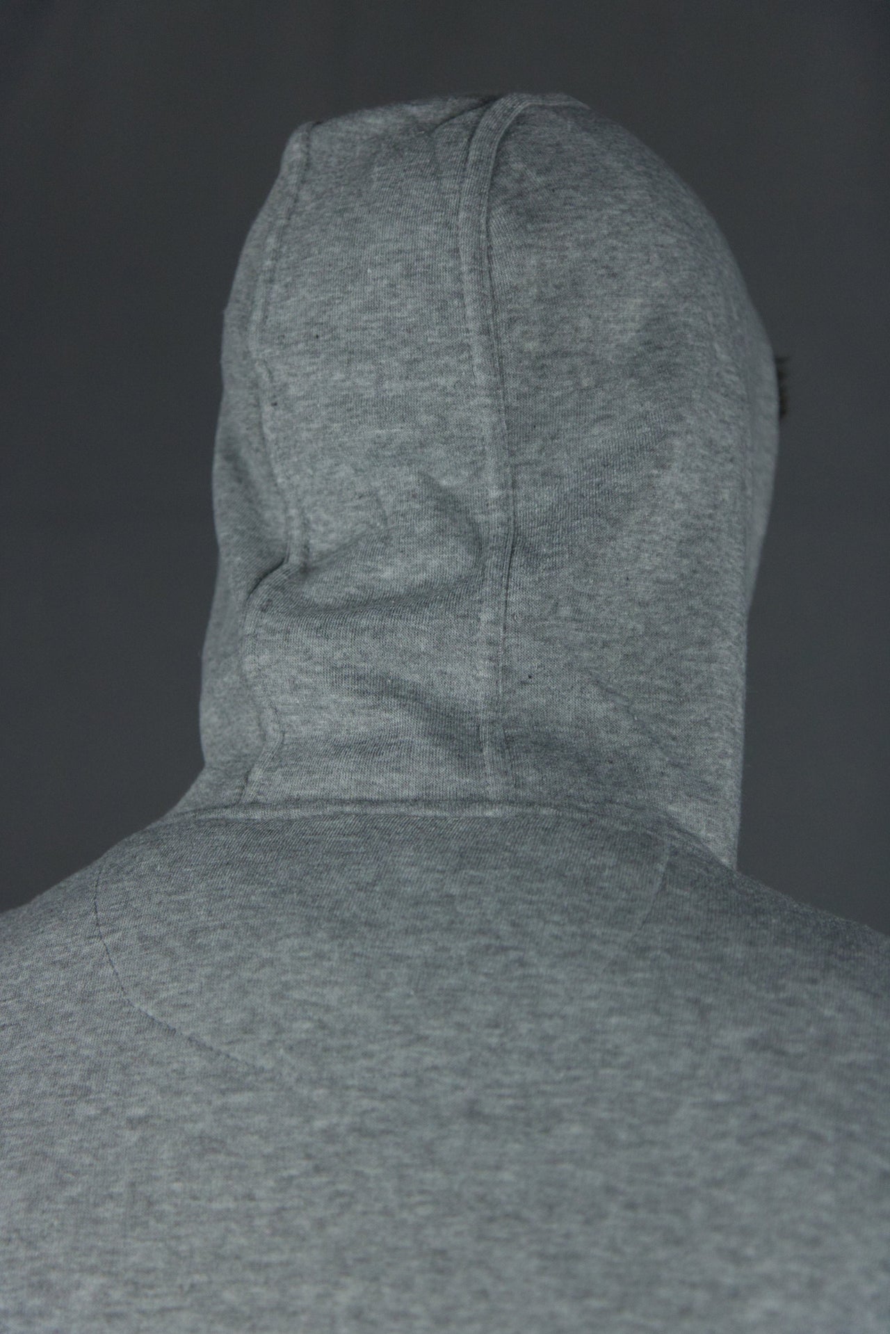 The three panel construction on the classic fleece heather gray pullover hoodie's hood allows for it to sit comfortably on the wearer's head