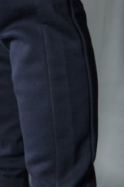 The navy Jordan Craig joggers set is stitched with Cotton and Polyester.