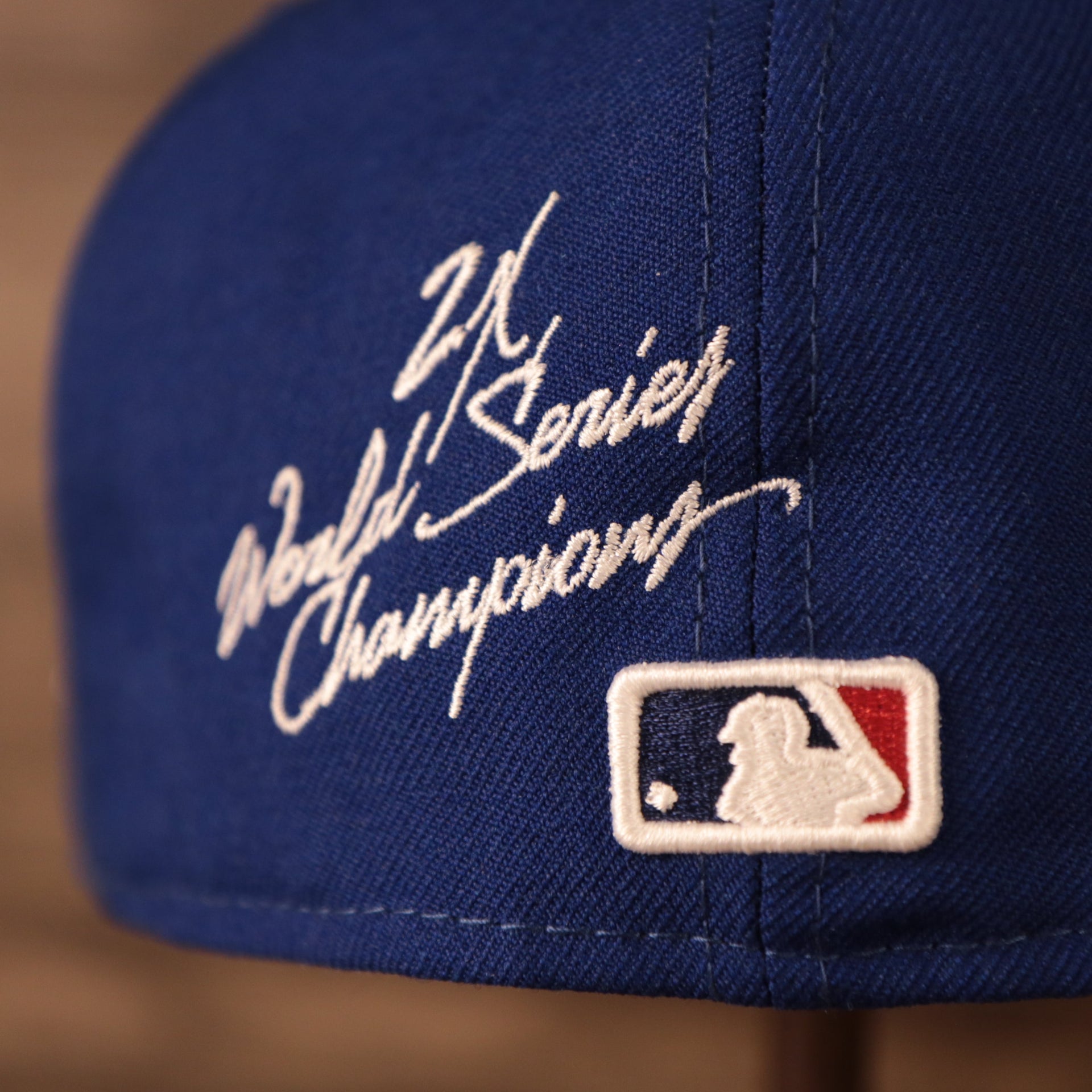 Close up of the 2X World Series Champions script on the New York Mets All Over World Series Side Patch 2x Champ Gray Bottom 59Fifty Fitted Cap