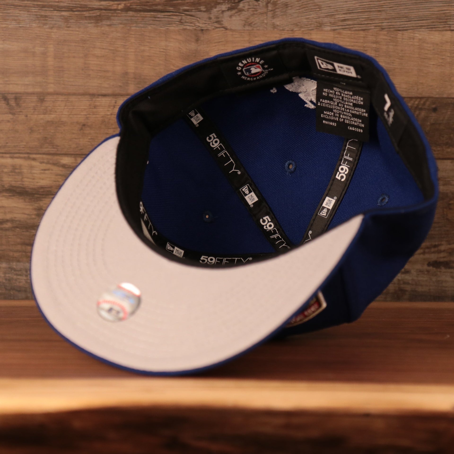 Gray bottom of the New York Mets All Over World Series Side Patch 2x Champ Gray Bottom 59Fifty Fitted Cap