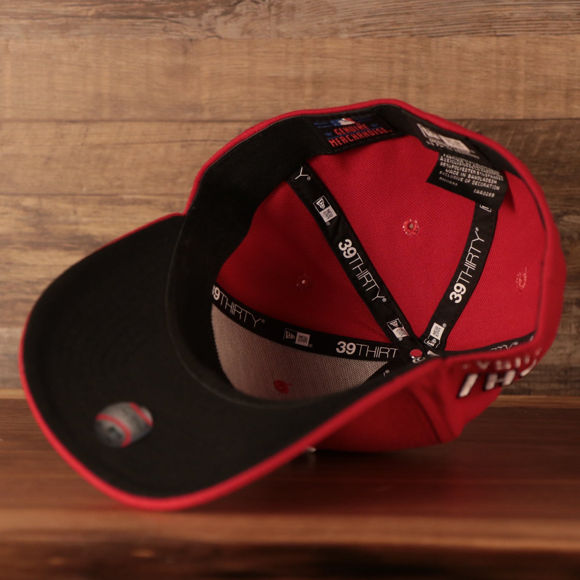 An inside view of the black underbrim Philadelphia Phillies 2021 fourth of July red 39thirty flexfit hat by New Era.