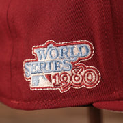 A close up shot of the 1980 World Series patch on the wearer's right side of the maroon Phillies all over patch fitted cap by New Era.