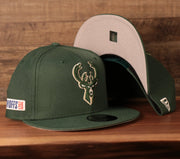 front and bottom of the Milwaukee Bucks 2021 NBA Playoffs 9Fifty Gray Bottom Side Patch Snapback Hat