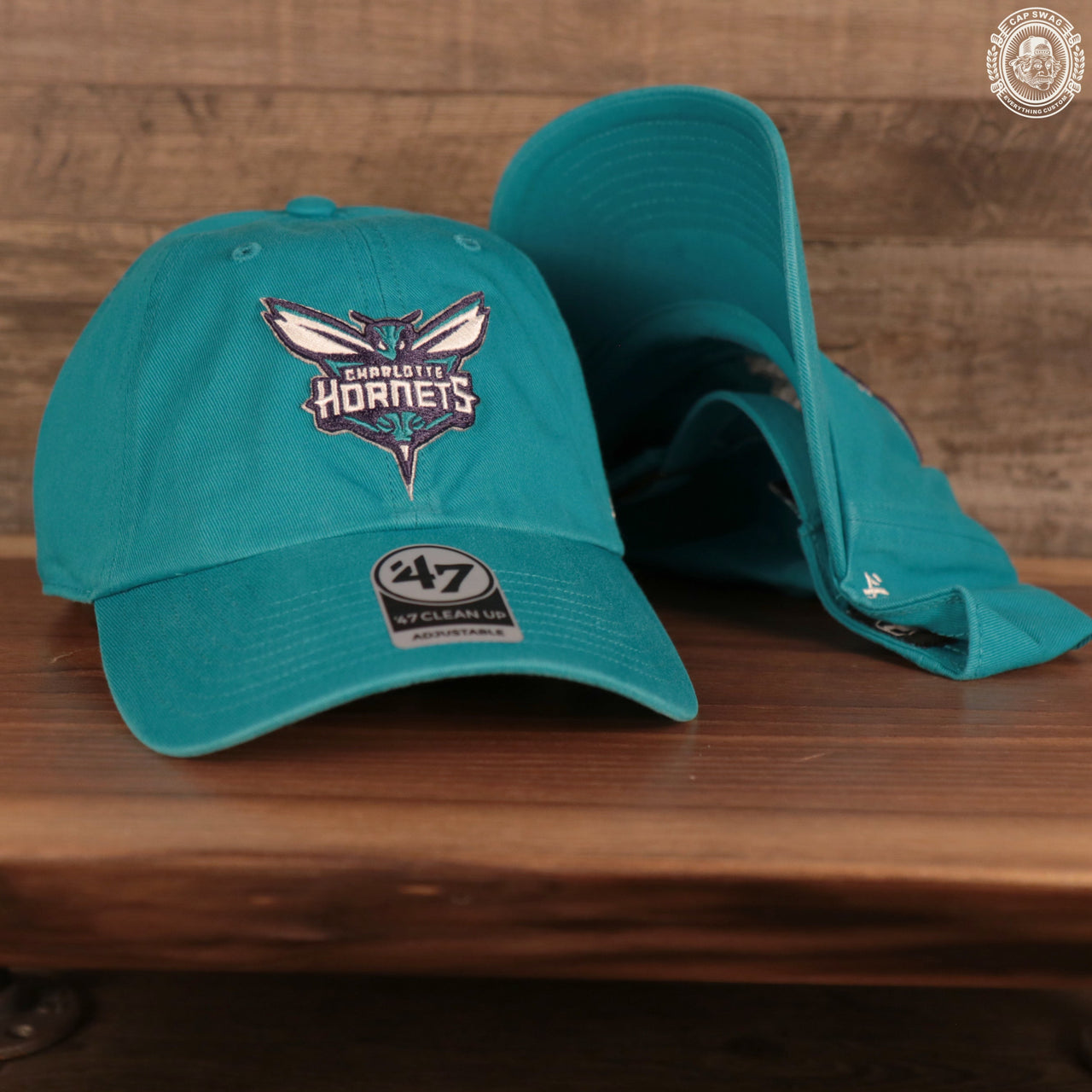 front and bottom of the Charlotte Hornets Cyan Adjustable Dad Hat