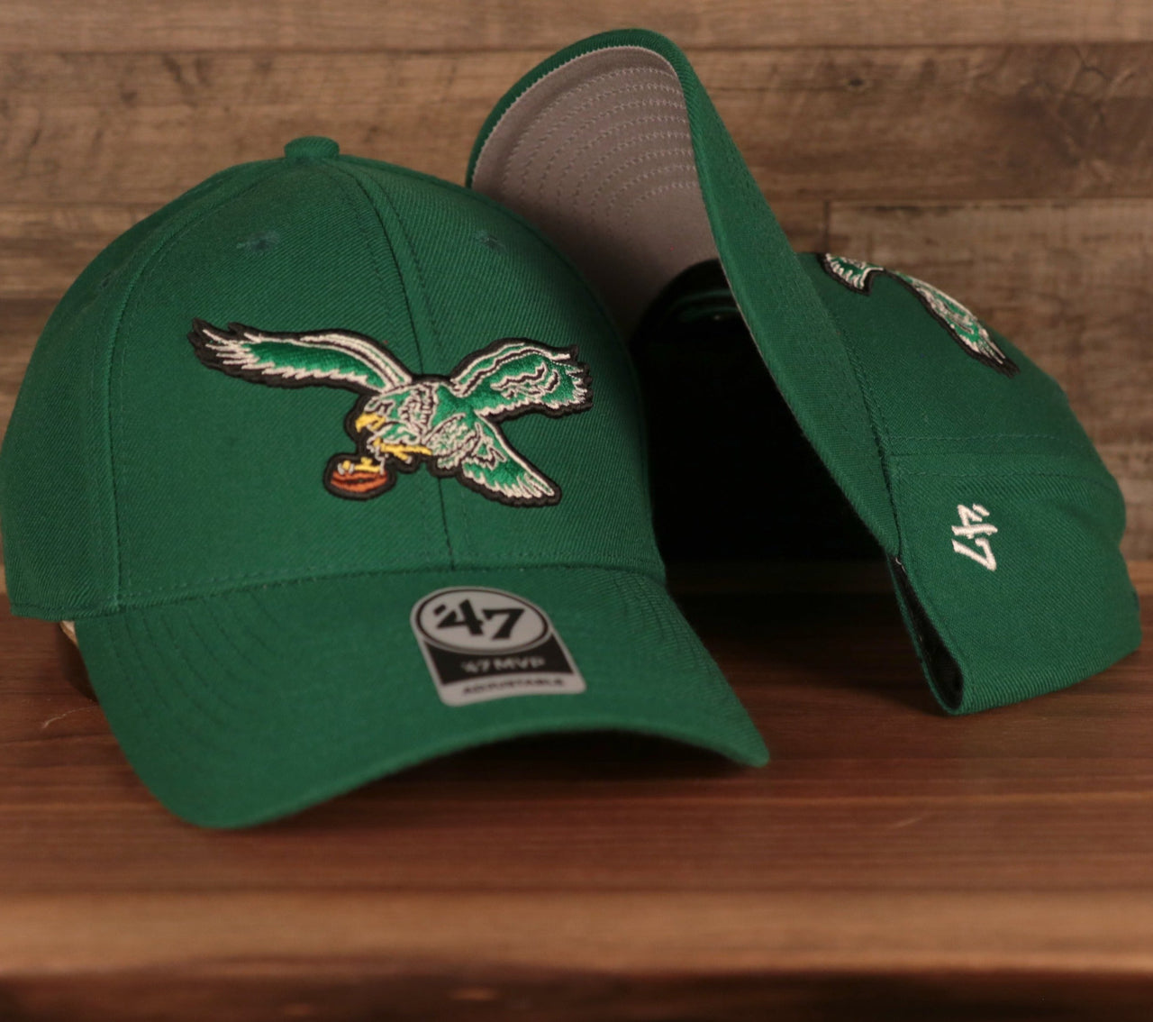 front and bottom of the Philadelphia Eagles Throwback Kelly Green Adjustable Dad Hat OSFM