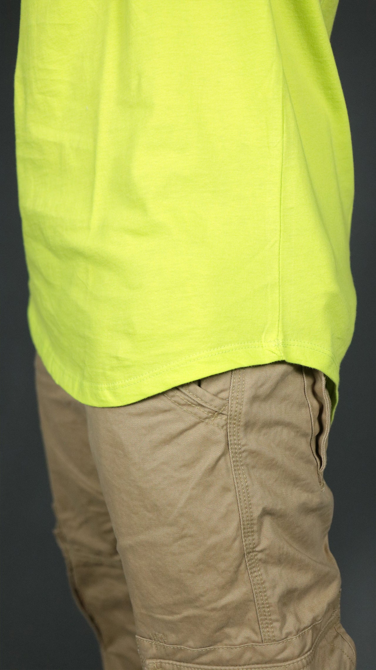 The yellow Jordan Craig longline shirt for men has a scoop bottom.