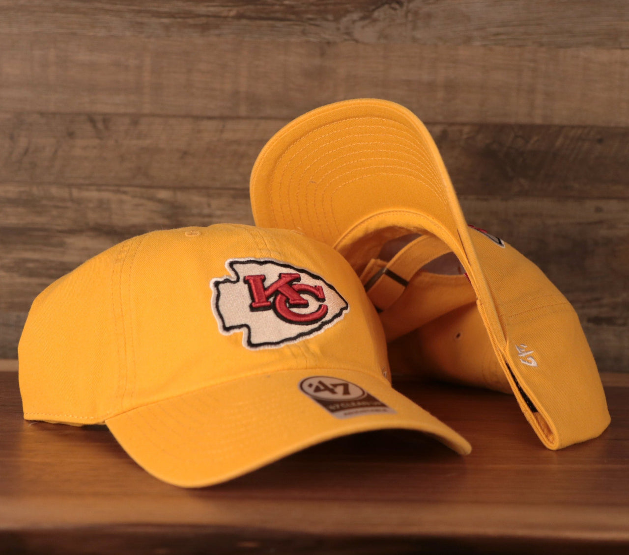 front and bottom of the Kansas City Chiefs Yellow Adjustable Dad Hat