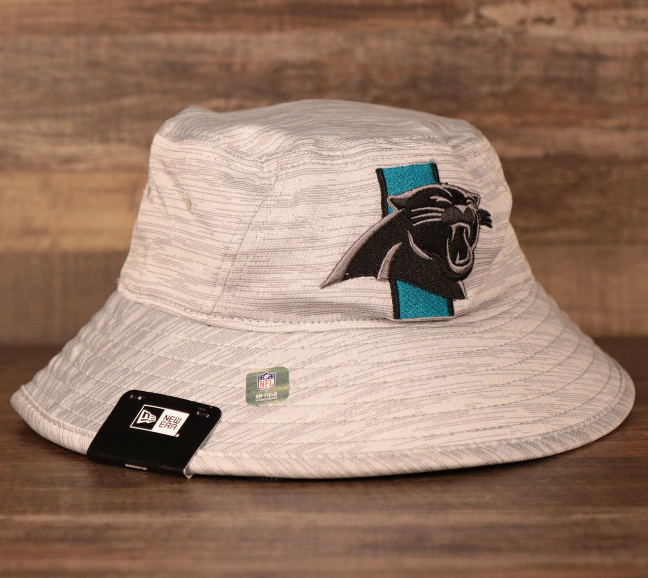 The gray Carolina Panthers New Era 2021 Training bucket hat by New Era.