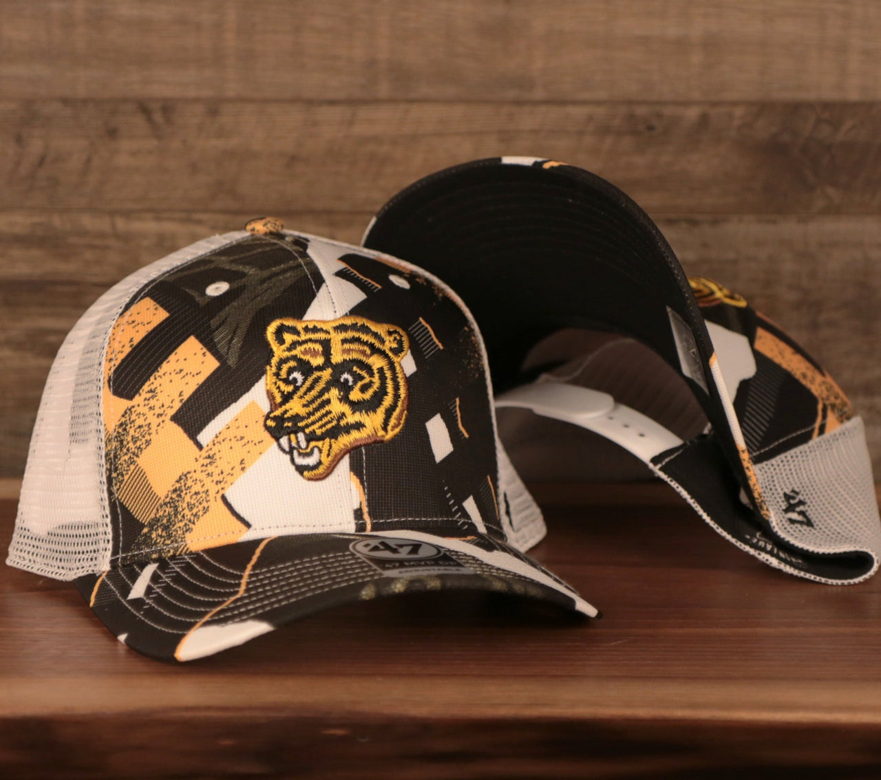 front and bottom of the Boston Bruins Brown, White, and Yellow Retro Adjustable Trucker Dad Hat