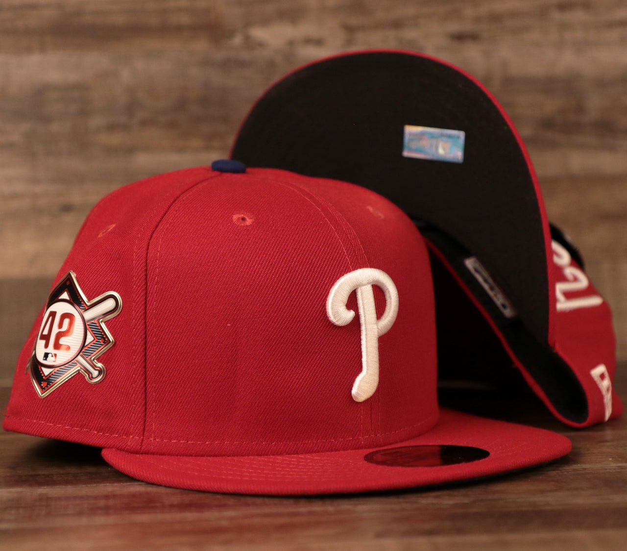Top and Bottom View of the Phillies 59Fifty Fitted Hat with #42 Side Patch