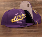 The purple Los Angeles Lakers tear logo design on this 9fifty snapback hat by New Era.