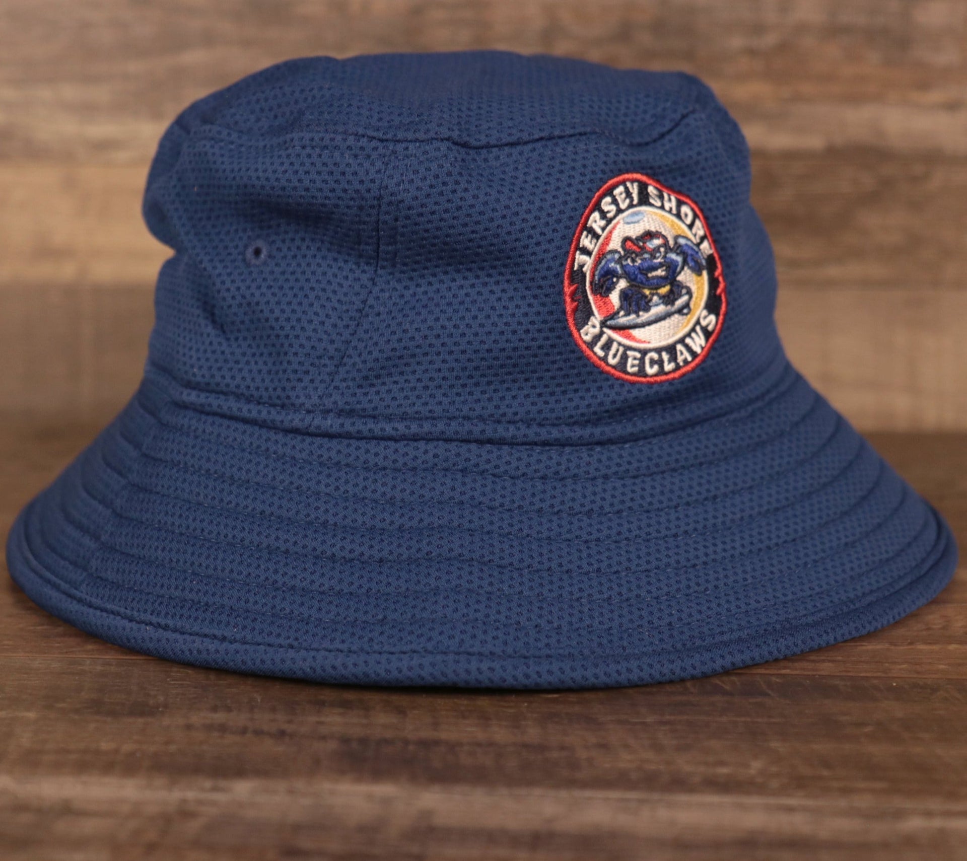 The Jersey Shore BlueClaws bucket hat is made out of 100% polyester featuring the Jersey Shore BlueClaws logo embroidered on the front
